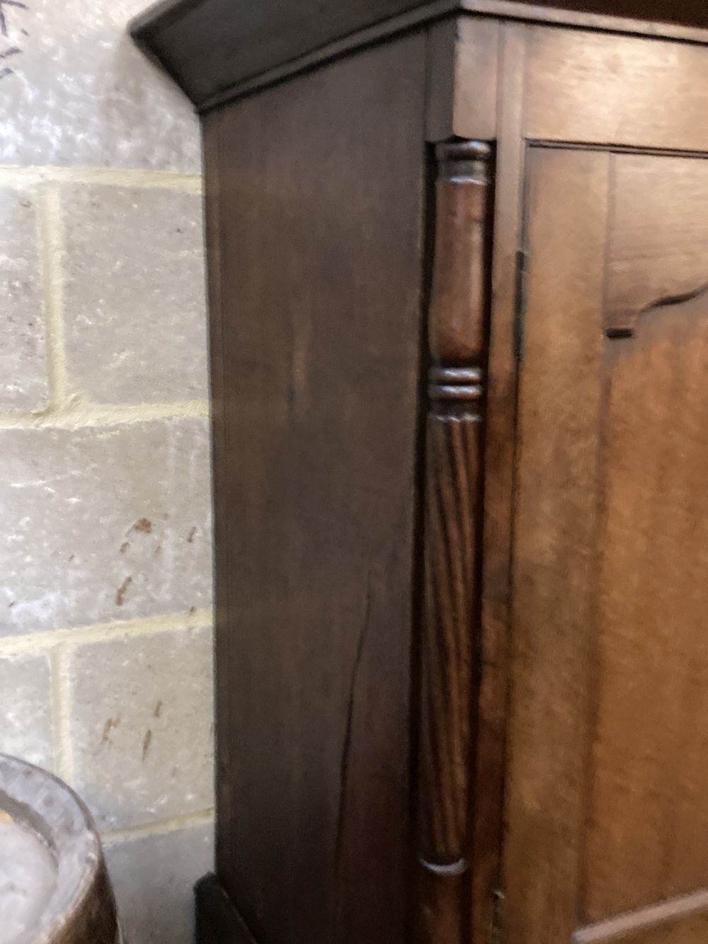 A George III oak housekeepers cupboard, width 138cm depth 52cm height 174cm